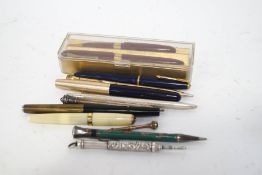 A collection of fountain pens and propelling pencils,