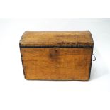 A pine trunk with dome top and iron handles, formerly leather covered,