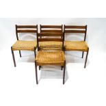 A set of four Danish teak dining chairs with papercord seats,