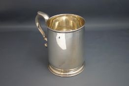 A silver mug, maker I.F.