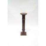 A late Victorian mahogany jardiniere stand, with turned and reeded column,