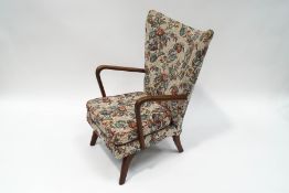 A 1950's beech frame armchair,