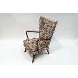 A 1950's beech frame armchair,