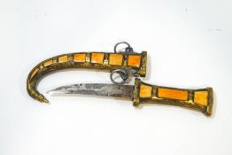 Two Middle Eastern daggers within metal mounted stained bone sheaths,