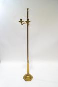 A brass ecclesiastical adjustable candle stand,