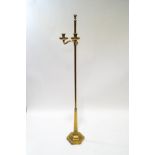 A brass ecclesiastical adjustable candle stand,