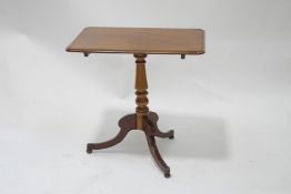 A Victorian mahogany rectangular snap top supper table, standing on tripod base, 72cm high x 56.