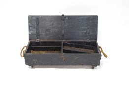 A WWI gun box with rope handles,