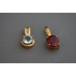 Two 9ct gold stone set pendants, 4.