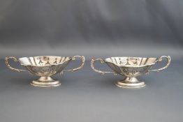 A pair of two handled silver salts, Birmingham 1918, 66g (2.