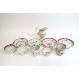 An 18th century Chinese Export porcelain tea bowl and saucer, a milk jug,