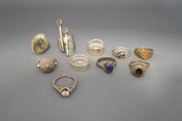 A collection of ten silver and silver coloured rings,