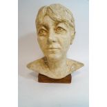 A contemporary plaster bust of a lady, upon a wooden base,