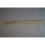 A 9ct gold chain, of filed curb links, 39.5 cm long, 9.