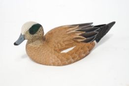 A carved and painted figure of a widgeon duck by Kirsten L.M.