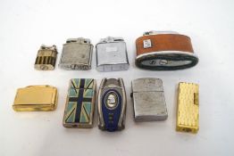 A collection of nine lighters,