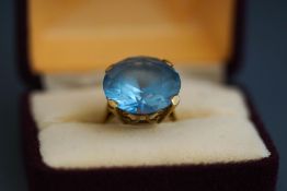 A 9 carat gold blue synthetic spinel ring, finger size O, 7.