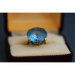 A 9 carat gold blue synthetic spinel ring, finger size O, 7.