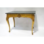 A 19th century gilded centre table with green marble top,