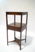 A George III style mahogany two tier wash stand, with single drawer,