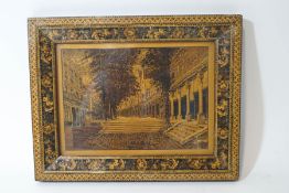 A Tunbridgeware panel depicting The Pantiles, with floral bordered frame, 19cm x 24.