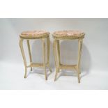 A pair of French painted tables with inset marble tops and cane undertier,