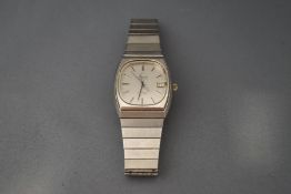 Omega, Deville, a mid-size stainless steel tonneau-shaped quartz bracelet watch,