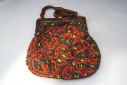 A decorative beadwork purse