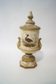 A Royal China Works Worcester pedestal vase and cover, painted with a crane and gilt detail,