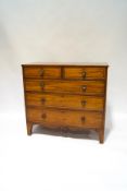 A George IV mahogany chest of two short over three long drawers,