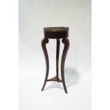 A French style mahogany jardiniere stand with pierced gallery above three slender shaped legs with