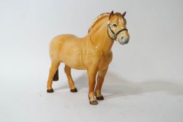 A Beswick Suffolk Punch horse, printed factory marks, 16.