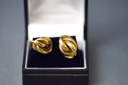 A pair of 9 carat gold knot ear studs, 2.