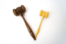 A late 19th century turned ivory gavel, 15cm long, and a wooden gavel,