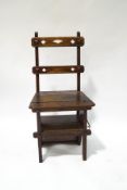 A late Victorian oak metamorphic chair/steps, with ecclesiastical detail,