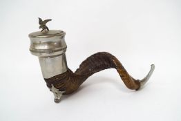 A Scottish ram's horn snuff mull with pewter mounts and bird of prey figure to lid,