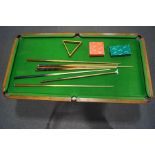 A late 19th century 1/4 size snooker table by R.
