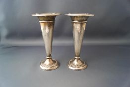 A pair of loaded silver spill vases, Birmingham 1921,