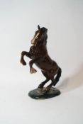 A Beswick model of a rearing bay horse, model number 1014, impressed marks,