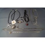 A collection of silver and silver coloured jewellery with watch