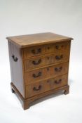 A 19th century mahogany chest of four drawers, with additional carrying handles to the sides,
