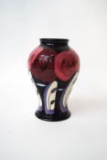 A modern Moorcroft pottery vase with Rennie Rose pattern, printed and painted factory marks,