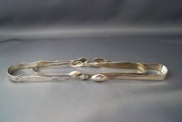 A pair of silver sugar tongs,