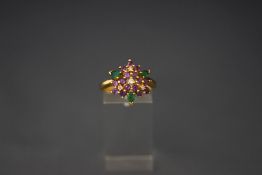 An amethyst, emerald and diamond cluster ring in the colours of the Suffrage movement, ring size P,
