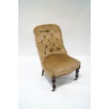 A Victorian mahogany button back chair with shaped seat,