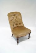 A Victorian mahogany button back chair with shaped seat,