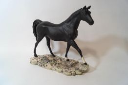 A large Beswick model of a hunter horse, matt finish, on naturalistic base, printed factory mark,