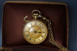 A fob watch, the four piece hinged case, stamped '18K' with a gilt metal cuvette,