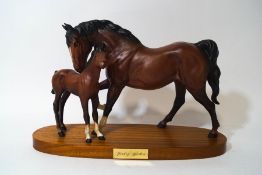 A Beswick model of a horse and foal - 'Spirit of Affection', matt finish, on a wooden base,