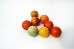 Eight stained ivory snooker balls,